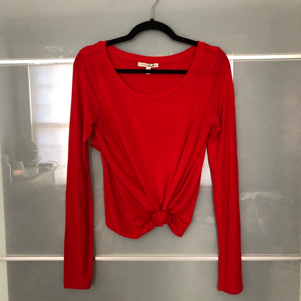 Express Long Sleeve Top with Cross Back Hem